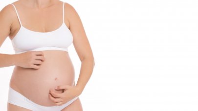 photo of a pregnant woman with a dermatological disorder such as itchy skin.